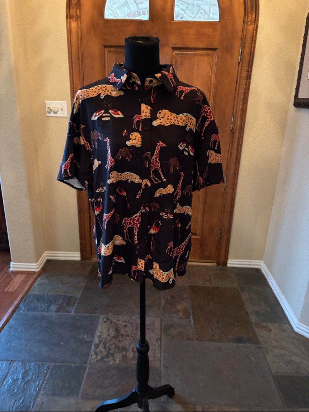 Woman’s Black Short-Sleeve Button-Up Shirt with Animal Print